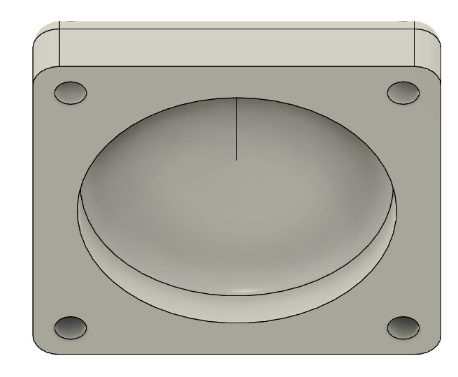 Toujours une vue 3D. On voit la pièce supérieure vue du dessous. Le trou ou s'insère l'airtag est bien visible au centre. On retrouve toujours les 4 trous pour les vis.